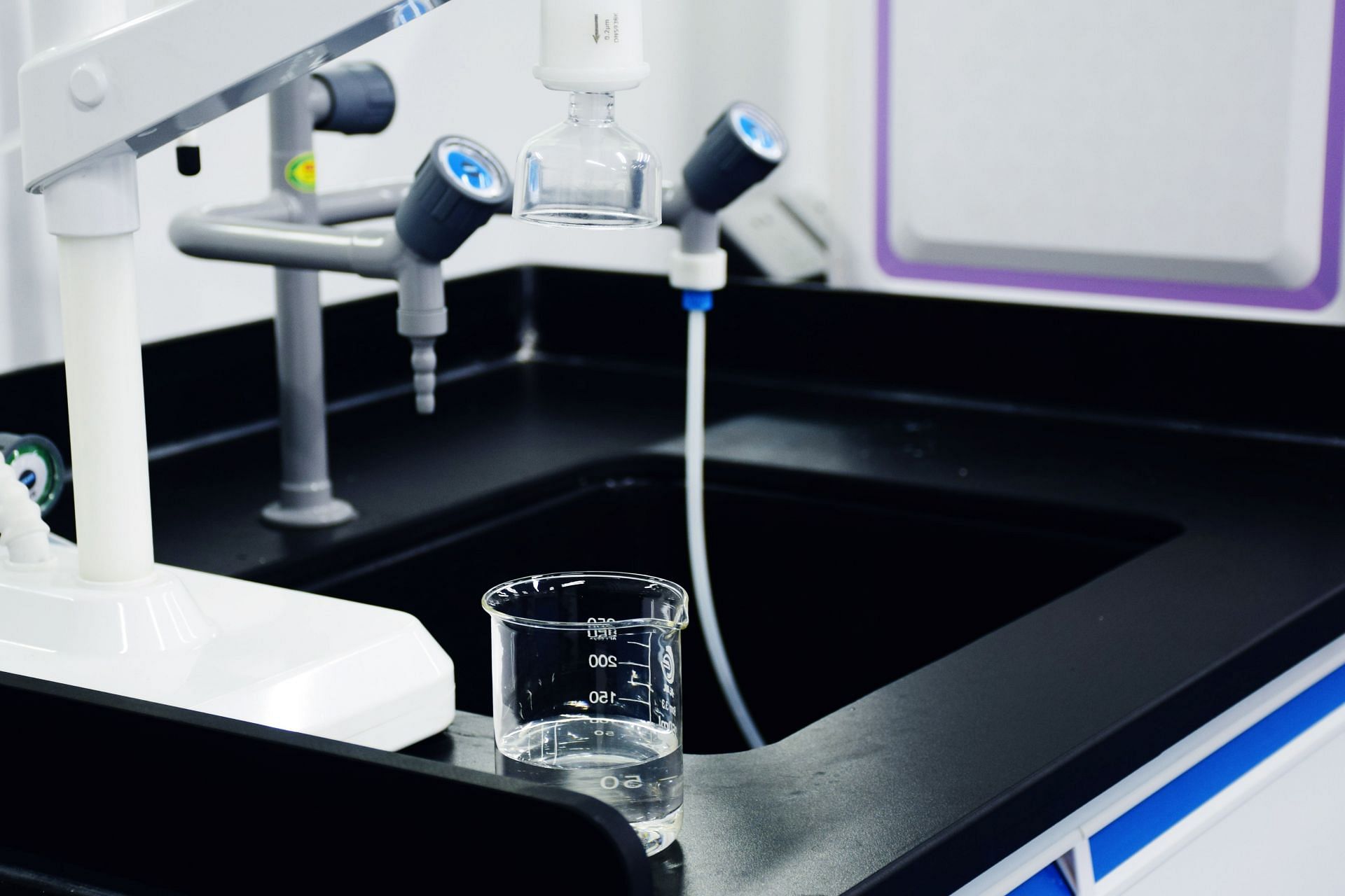 testing water and using filters can be helpful (Image via Unsplash / Rephile Water)